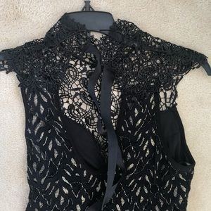 Black lace dress with ribbons to tie in the back